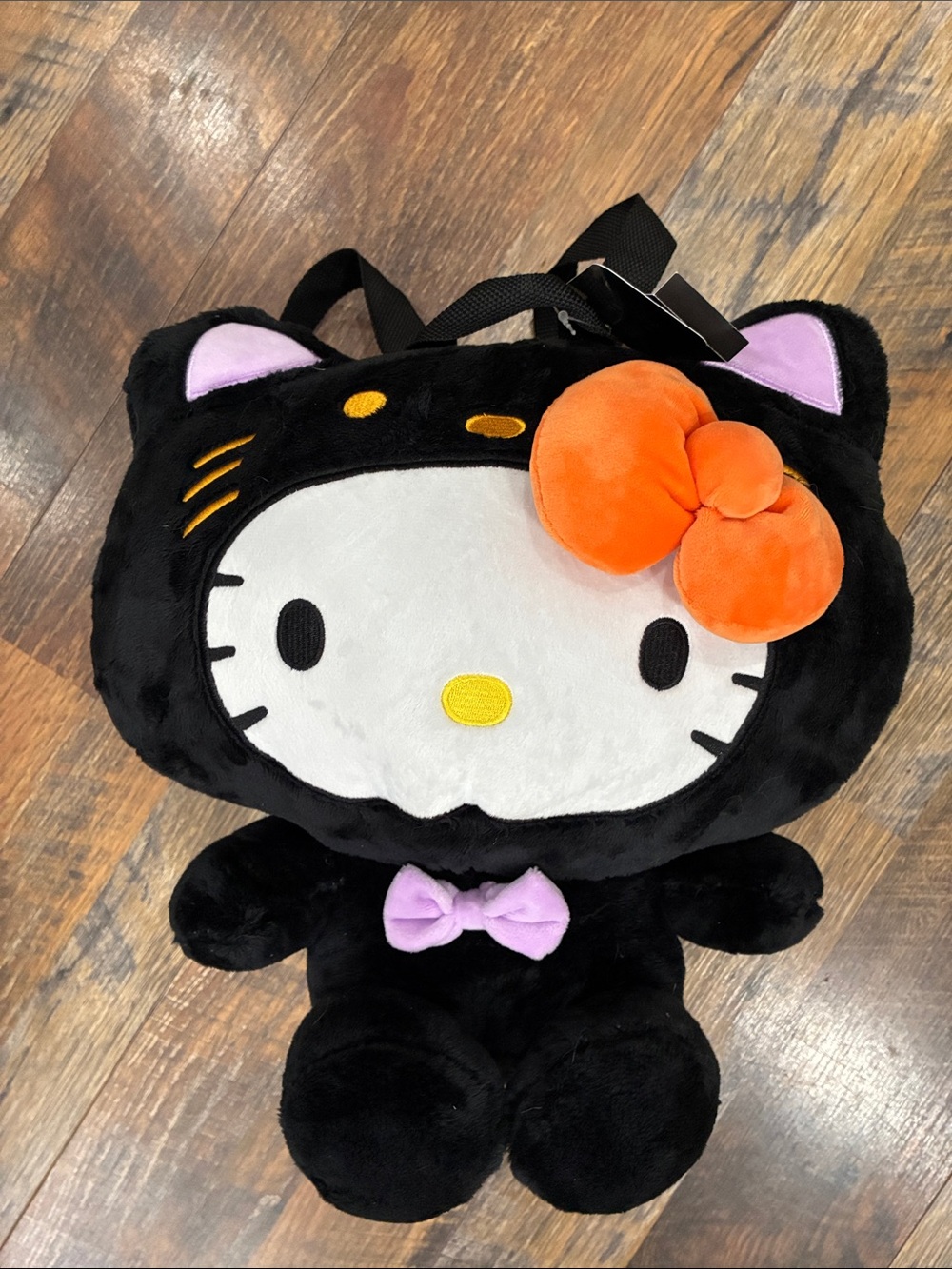Sanrio Hello Kitty Black Plush Cat Backpack with Orange Bow